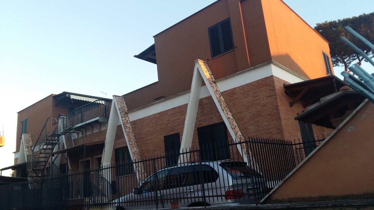 Soggiorno ad angolo roma : soggiorno con cucina a vista. soggiorno ...