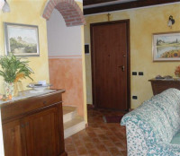 casa a schiera in vendita Badia Polesine foto 000__salotto.jpg
